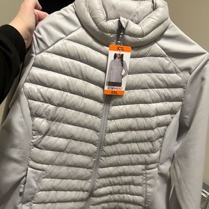 Women’s pulse size XXL Grey coat. Brand new with tags perfect condition.